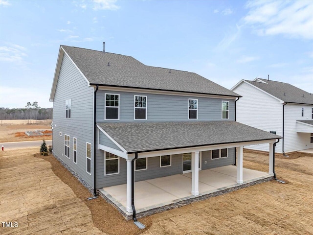 back of house featuring a patio