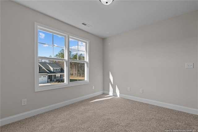 view of carpeted spare room