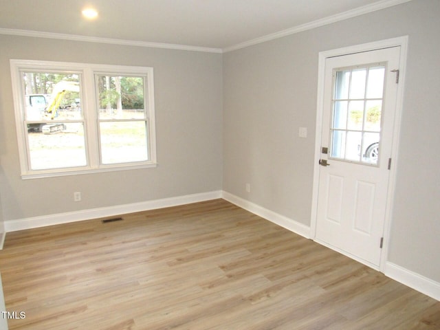 2253 NC Highway 96 S, Franklinton, NC 27525 - spare room with healthy amount of natural light, crown molding, and light wood finished floors