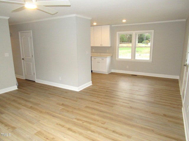 2253 NC Highway 96 S, Franklinton, NC 27525 - unfurnished living room featuring crown molding, a ceiling fan, light wood finished floors, and recessed lighting
