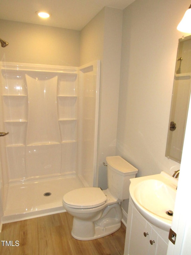 2253 NC Highway 96 S, Franklinton, NC 27525 - full bathroom with wood finished floors, vanity, a shower, and recessed lighting