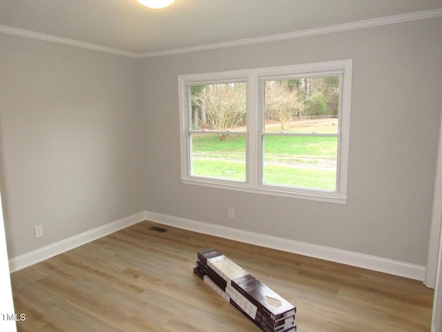 2253 NC Highway 96 S, Franklinton, NC 27525 - empty room with crown molding and light wood-style flooring