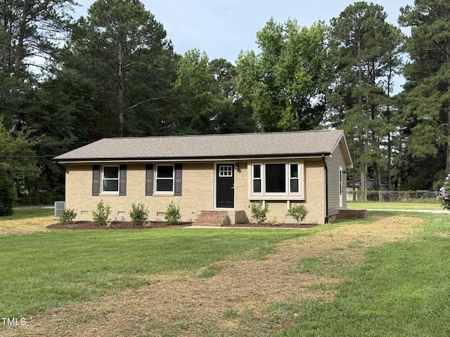 2253 NC Highway 96 S, Franklinton, NC 27525 - single story home featuring crawl space, brick siding, a front lawn, and roof with shingles
