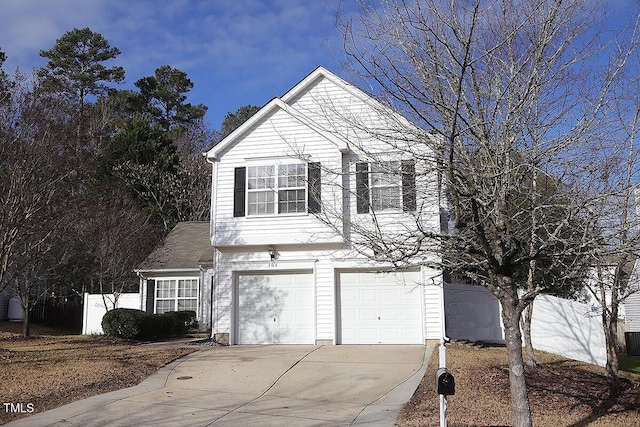 front of property with a garage