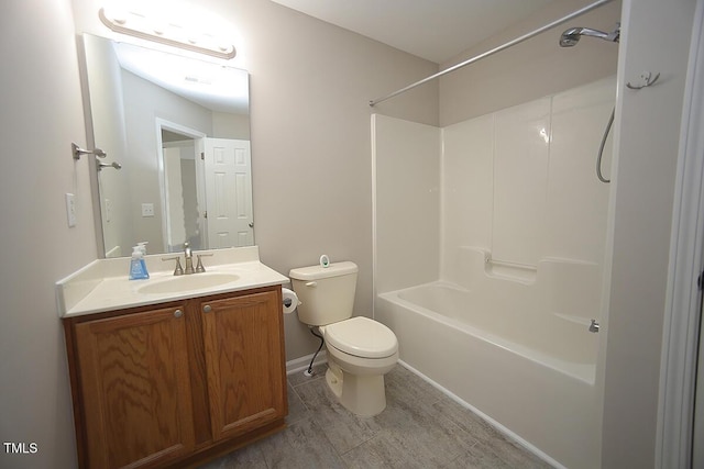 full bathroom with vanity, bathtub / shower combination, and toilet