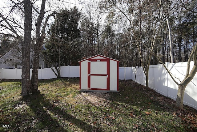 view of outdoor structure featuring a lawn