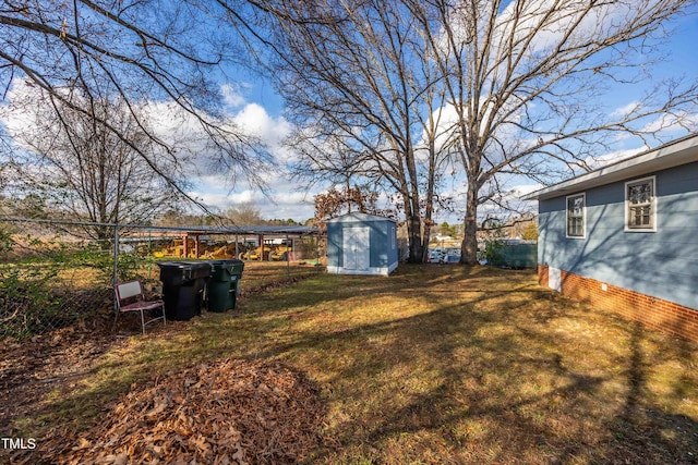 view of yard with a storage shed