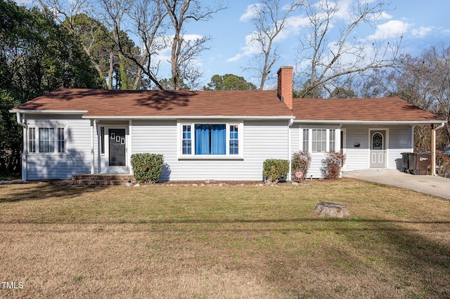 single story home with a front yard