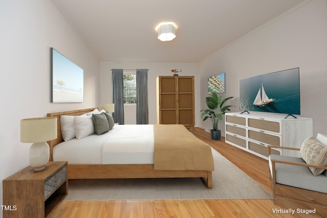 bedroom featuring hardwood / wood-style flooring