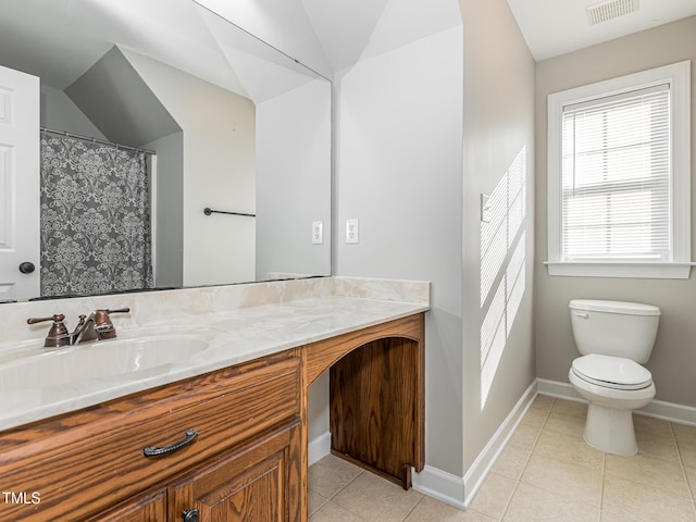 bathroom with tile patterned flooring, toilet, vanity, visible vents, and baseboards