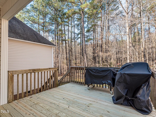 deck featuring a grill