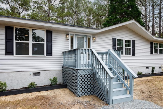 ranch-style home featuring crawl space