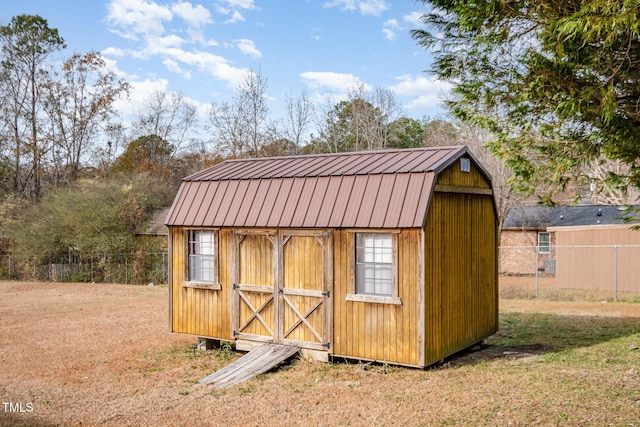 view of outdoor structure with a yard