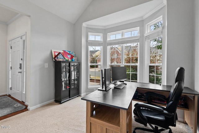 carpeted office space featuring lofted ceiling