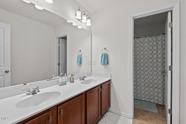 bathroom featuring a shower with curtain and vanity