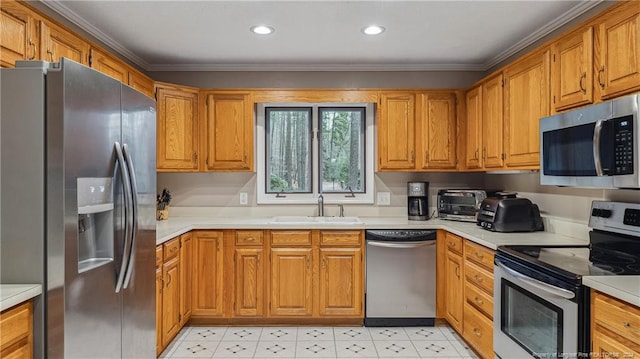 kitchen with crown molding, sink, and appliances with stainless steel finishes