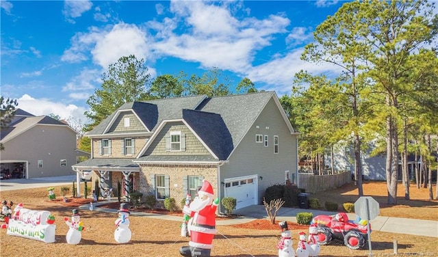 view of front of property with a garage