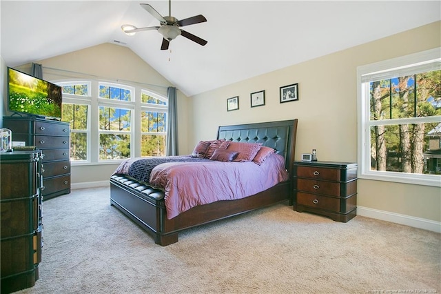 carpeted bedroom featuring ceiling fan and lofted ceiling