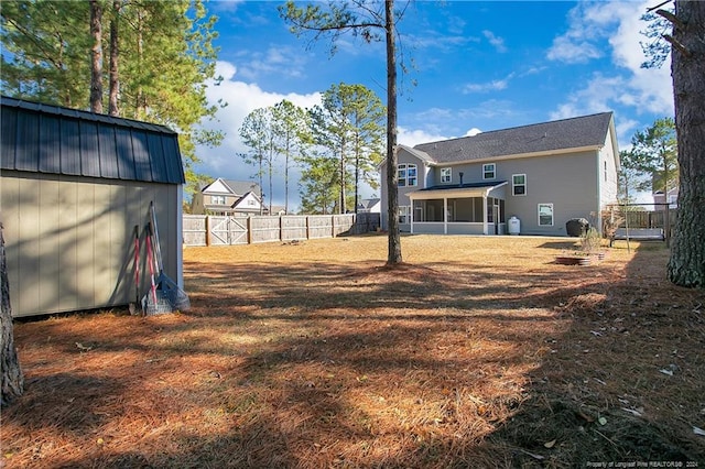 view of yard with a storage shed