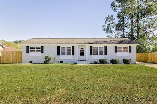 ranch-style house featuring a front lawn