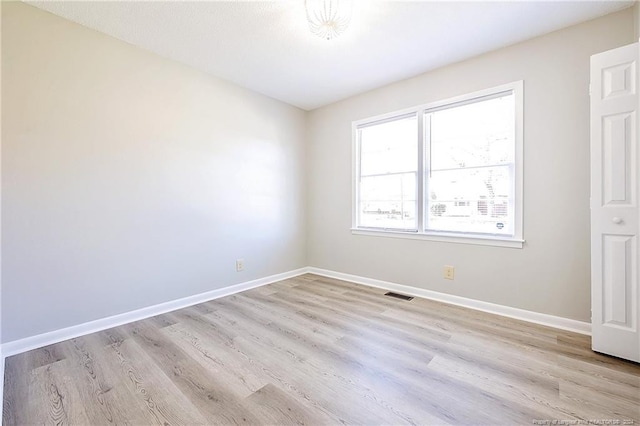 empty room featuring light wood-type flooring