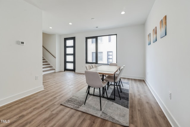 dining space featuring light hardwood / wood-style flooring