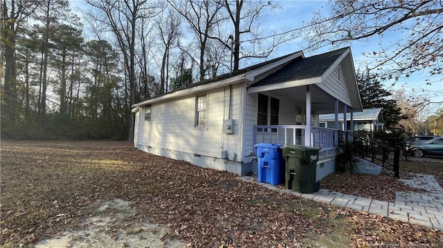 view of home's exterior with a porch