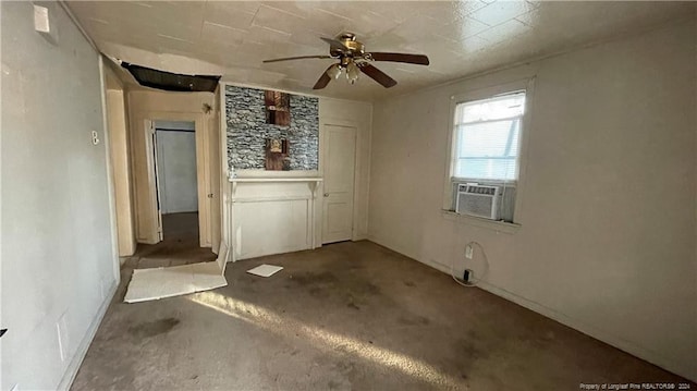 empty room featuring carpet, ceiling fan, and cooling unit