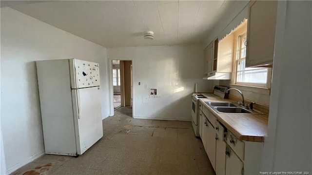 kitchen featuring white cabinetry, white appliances, and sink