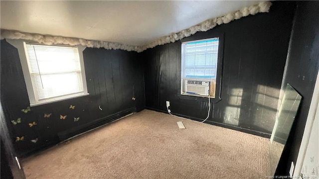 carpeted empty room featuring cooling unit