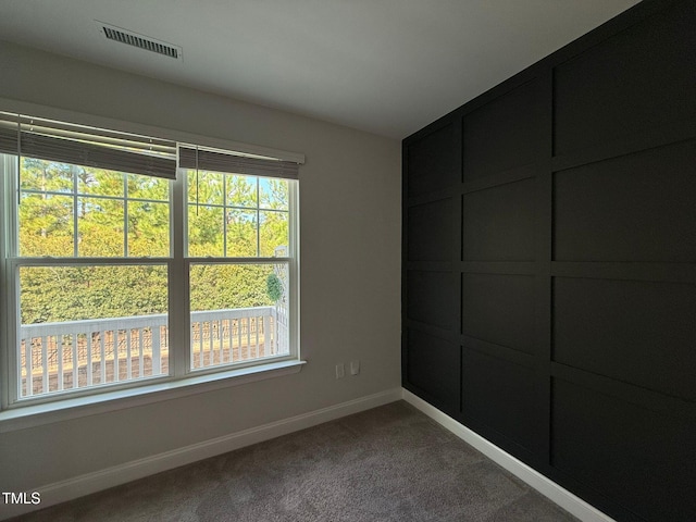 empty room with carpet floors