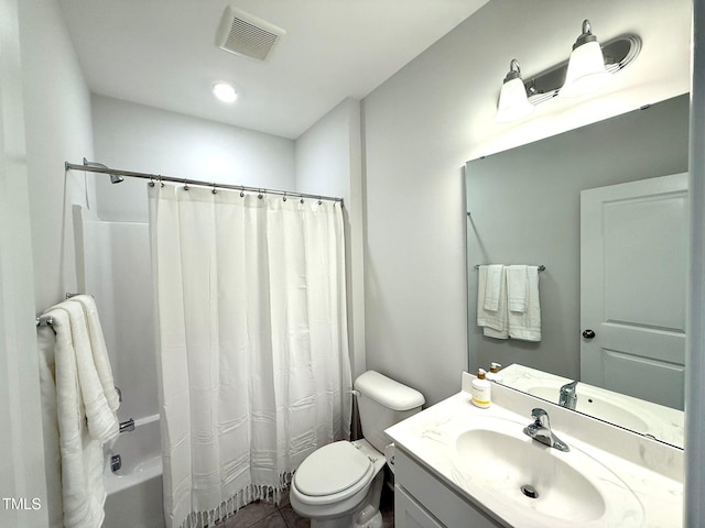 full bathroom featuring tile patterned flooring, vanity, shower / bath combination with curtain, and toilet