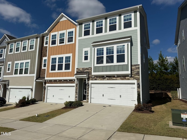 townhome / multi-family property featuring a garage