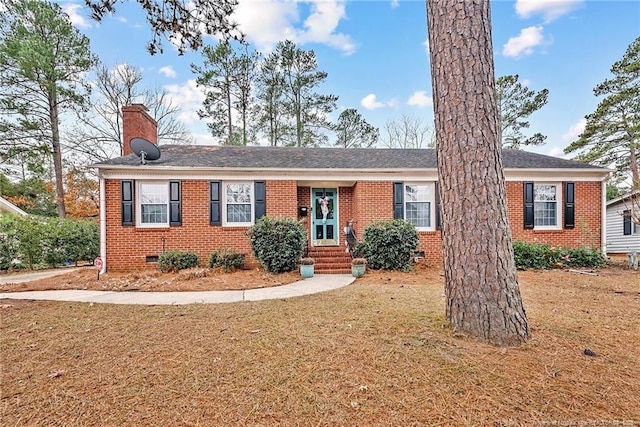 ranch-style house with a front yard