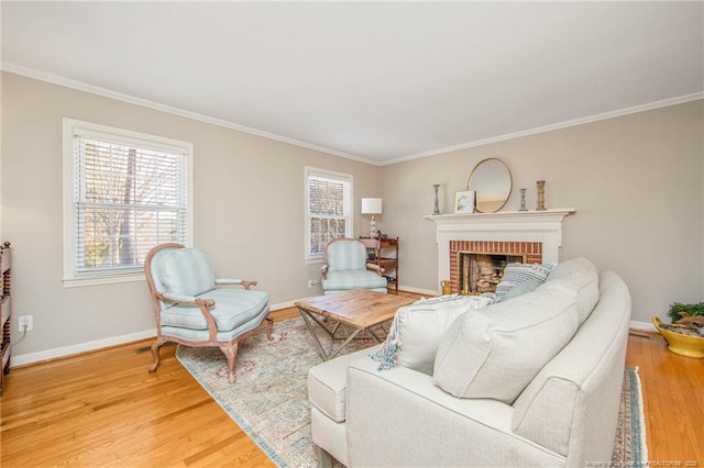 living room with ornamental molding, a healthy amount of sunlight, and hardwood / wood-style floors