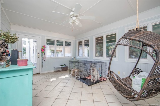 sunroom / solarium with ceiling fan