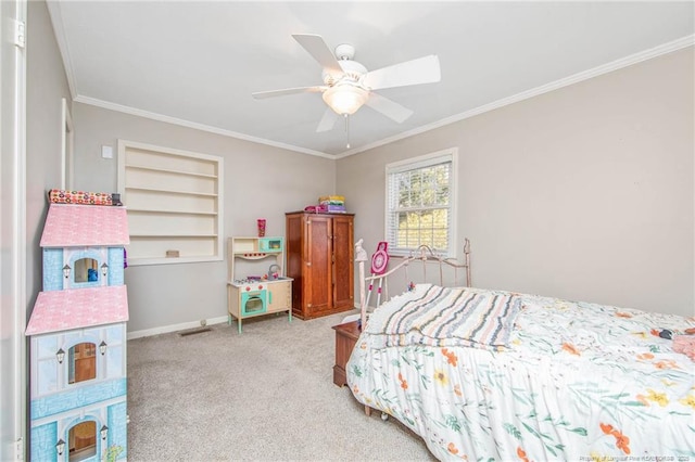 bedroom featuring crown molding, light colored carpet, and ceiling fan