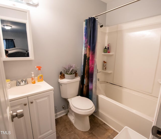 full bathroom with vanity, toilet, and shower / bath combo with shower curtain