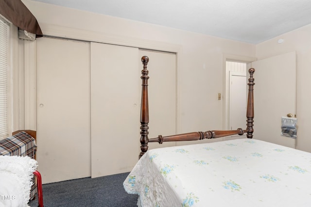 carpeted bedroom featuring a closet