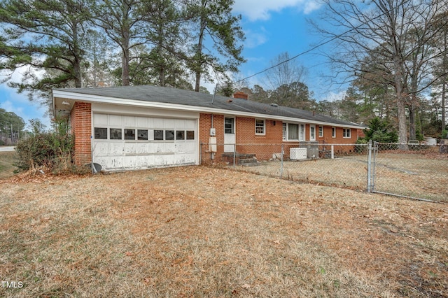 ranch-style home with a garage