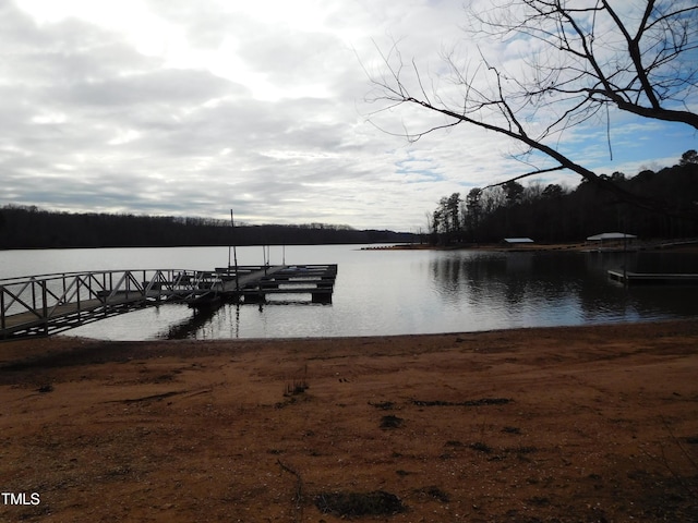 view of dock with a water view