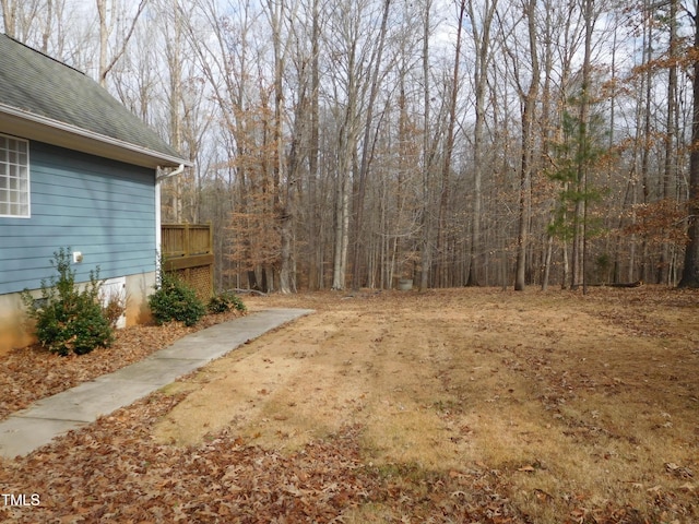 view of yard featuring a wooden deck