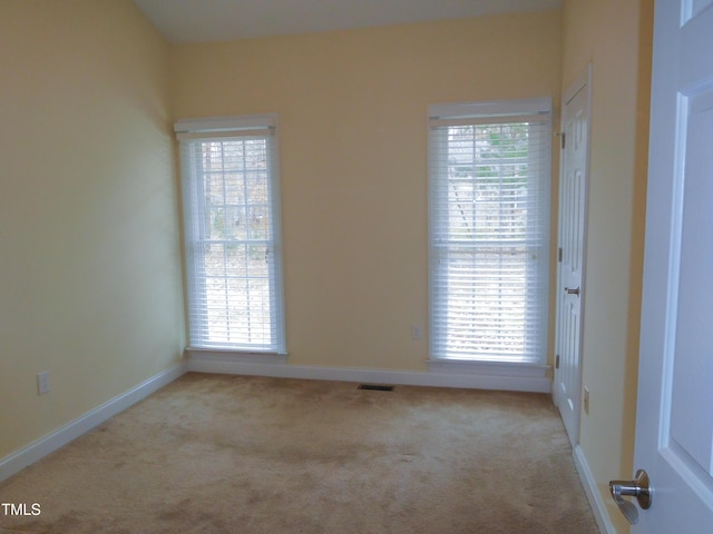 view of carpeted spare room