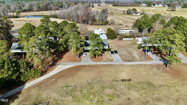 aerial view featuring a rural view and a water view