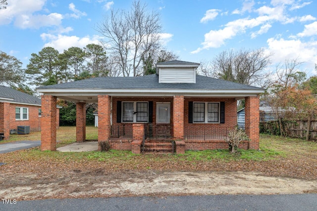 view of front of house with central AC and covered porch