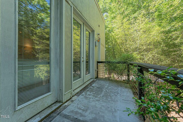 balcony featuring french doors