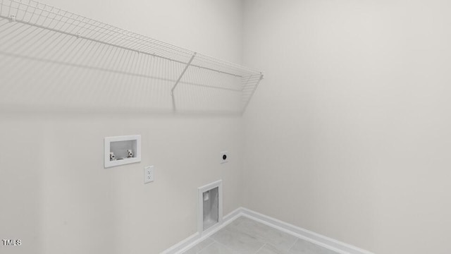 washroom with washer hookup and hookup for an electric dryer