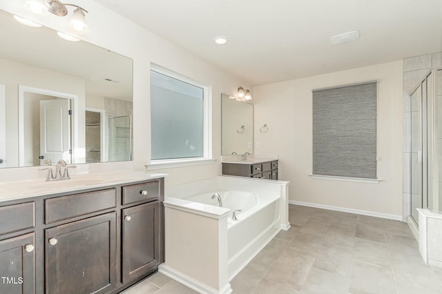 bathroom featuring tile patterned floors, vanity, and independent shower and bath