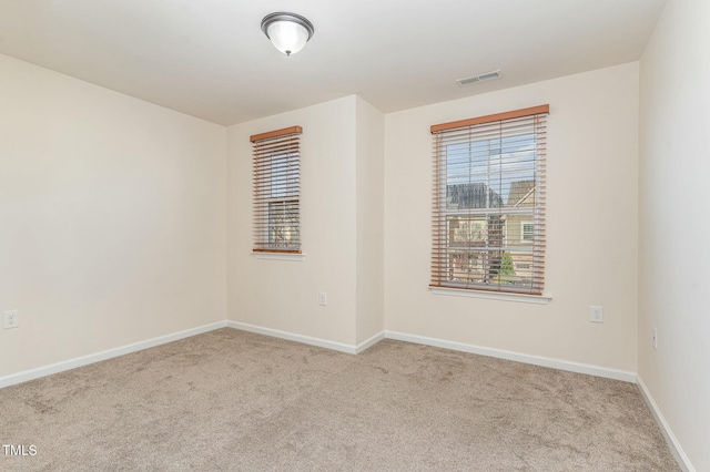 view of carpeted spare room