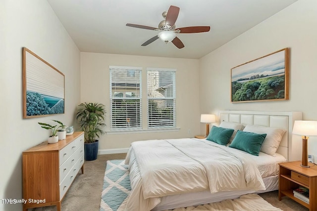 carpeted bedroom with ceiling fan